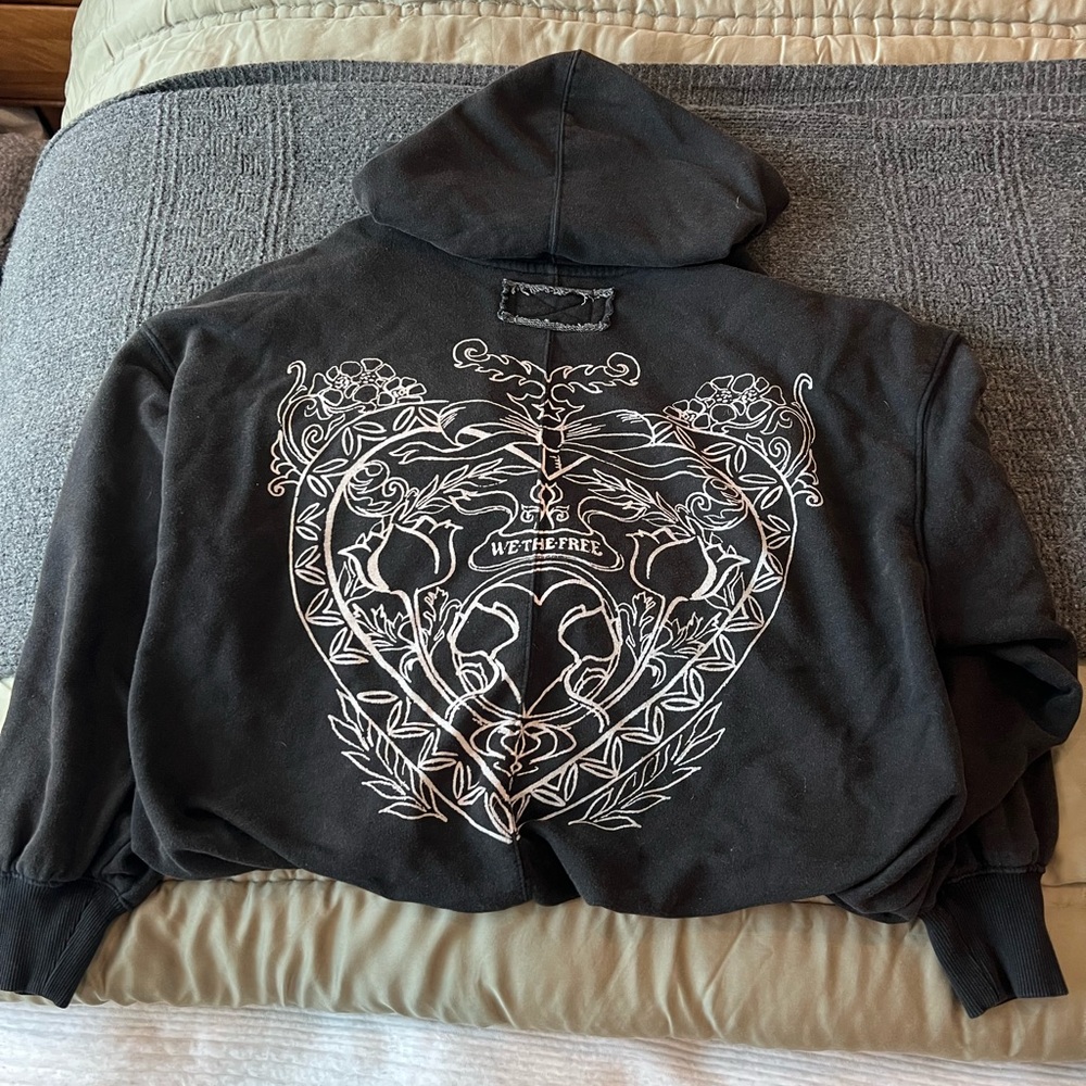 Free People Black Hoodie with White Graphic Design